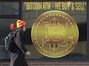 A sign advertising a Bitcoin ATM at a store in Halifax, NS