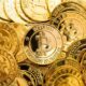 Bitcoin cryptocurrency background. A bunch of golden bitcoin, Digital currency